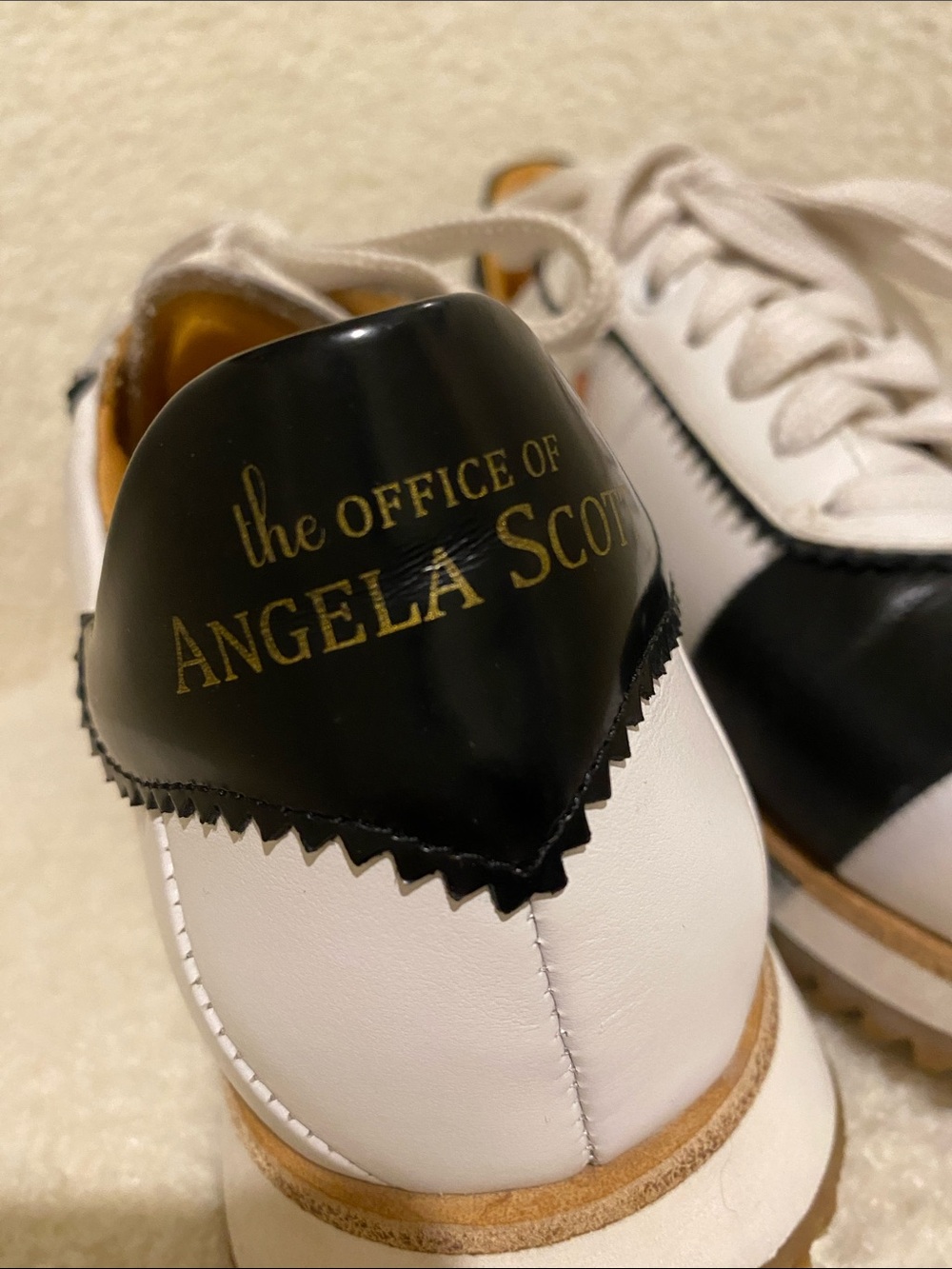 The Office of Angela Scott White and Black Women's Leather Sneakers